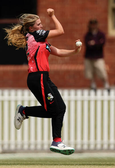 Female cricket player, bowling