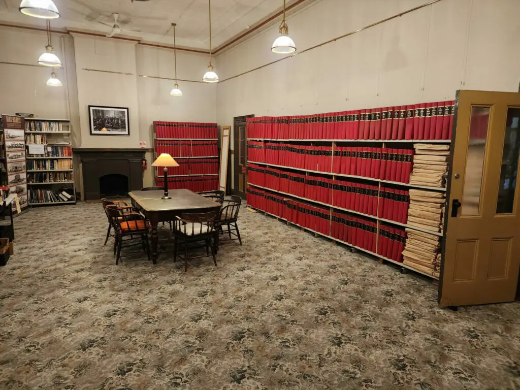 inside the hooper room with vintage newspapers in shelves