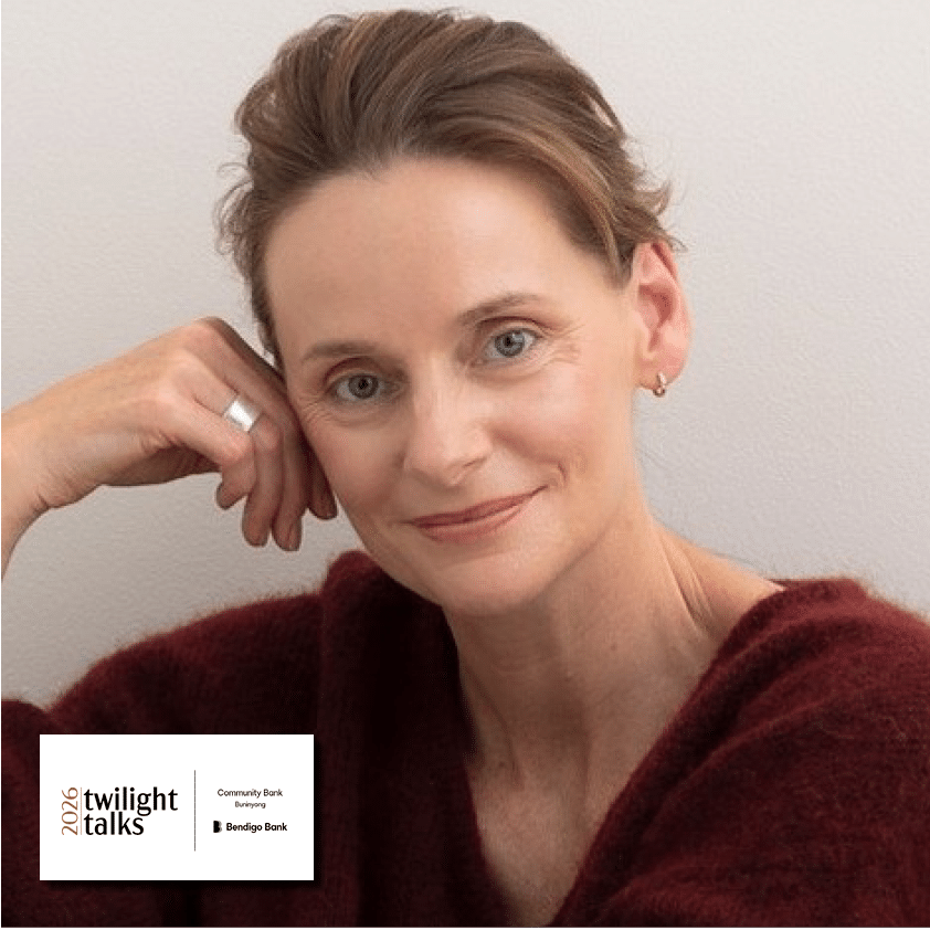 Woman smiling softly in burgundy jumper for Twilight Talks 2026