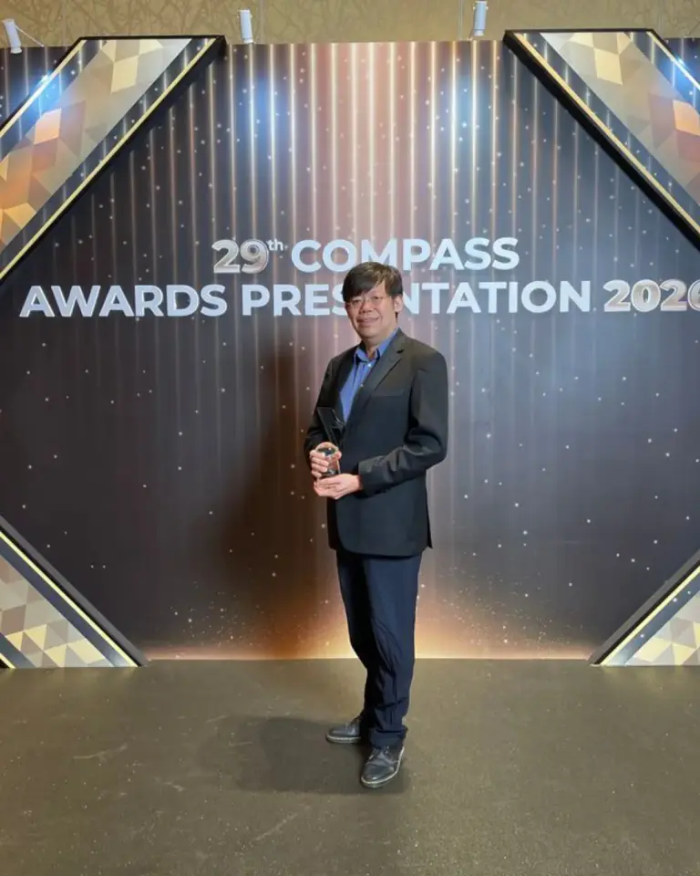 Man holding trophy at 29th Compass Awards Presentation 2020
