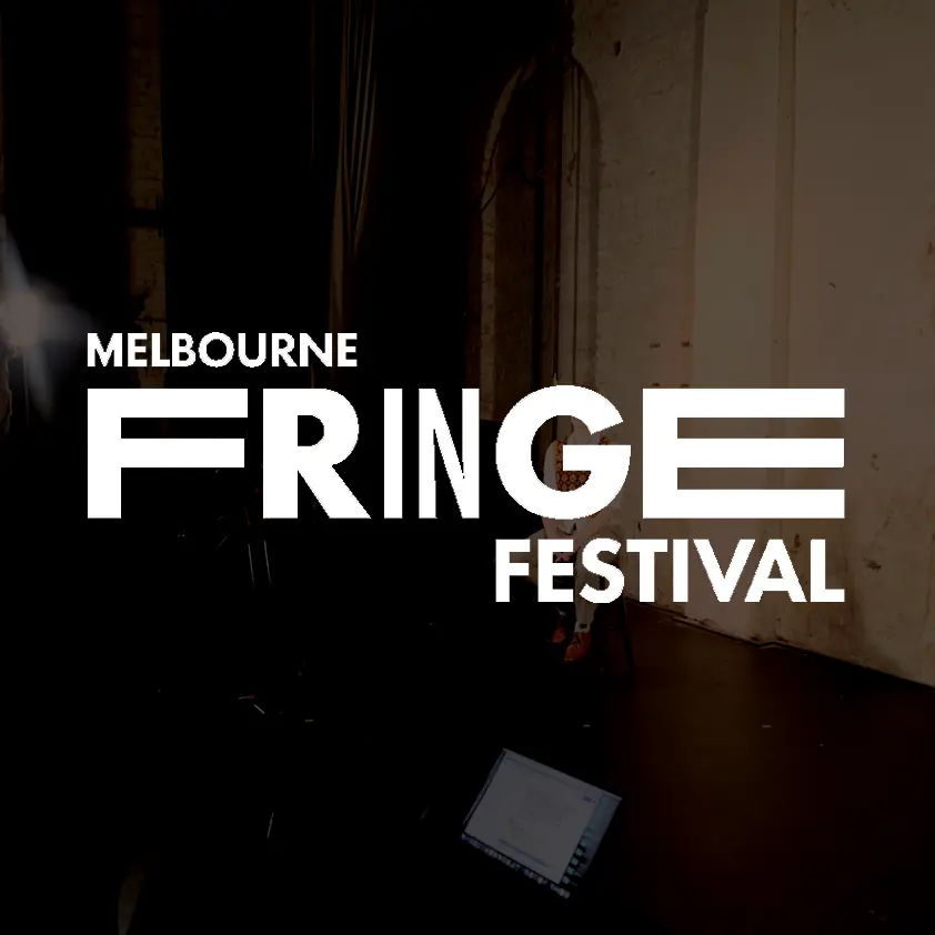 Melbourne Fringe Festival logo over dim stage